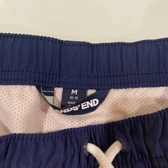 Boys size medium swim trunks. 2 pair in good shape and mesh lining. - Picture 2 of 6